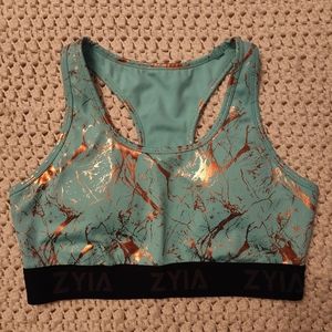 Teal with gold sports bra from Zyia